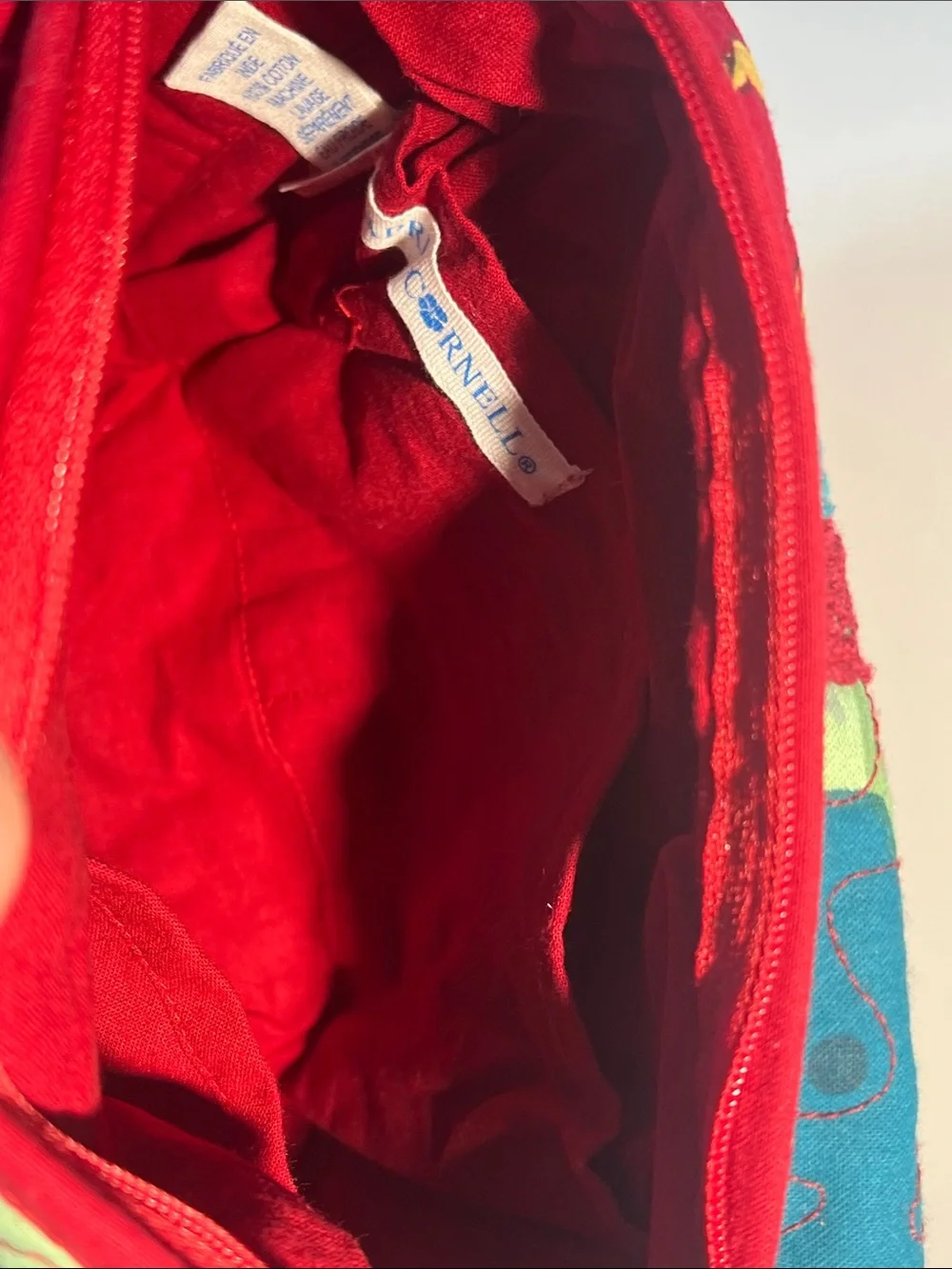 April Cornell Red Floral Quilted Cosmetic Crossbody with Teal Accents